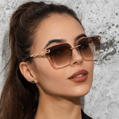 Frameless oversized square sunglasses with brown gradient lenses and gold-tone metal temples, featuring decorative black studs. - Image 32