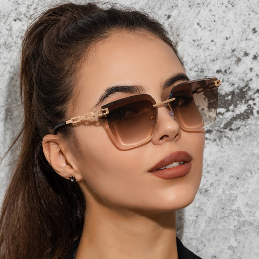 Frameless oversized square sunglasses with brown gradient lenses and gold-tone metal temples, featuring decorative black studs. - Image 32