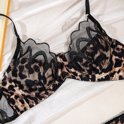 Leopard print bra and thong set with black lace trim, featuring an underwire bra and matching thong. - Image 21