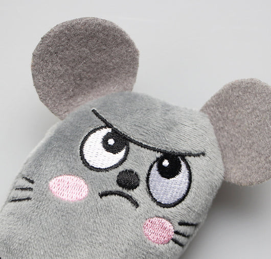 Light blue plush cat toy with embroidered sleepy eyes, pink cheeks, and black body markings. - Image 15