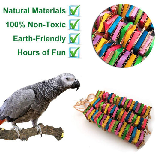 Colorful parrot gnawing toy with stacked cardboard blocks in red, green, yellow, blue, and pink, hanging from a rope. - Image 6