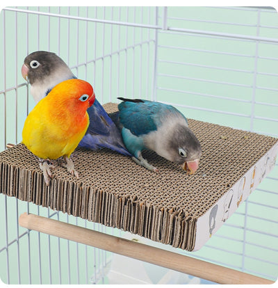 Three colorful lovebirds on a rectangular corrugated cardboard platform with screws, attached to a white bird cage. - Image 15