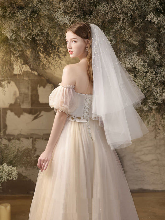 Vestido de Novia Midi Blanco con Escote Palabra de Honor y Detalles Brillantes - Image 15