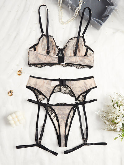 Nude and black embroidered sheer lingerie set with a bra, thong, and garter belt, featuring floral lace. - Image 10