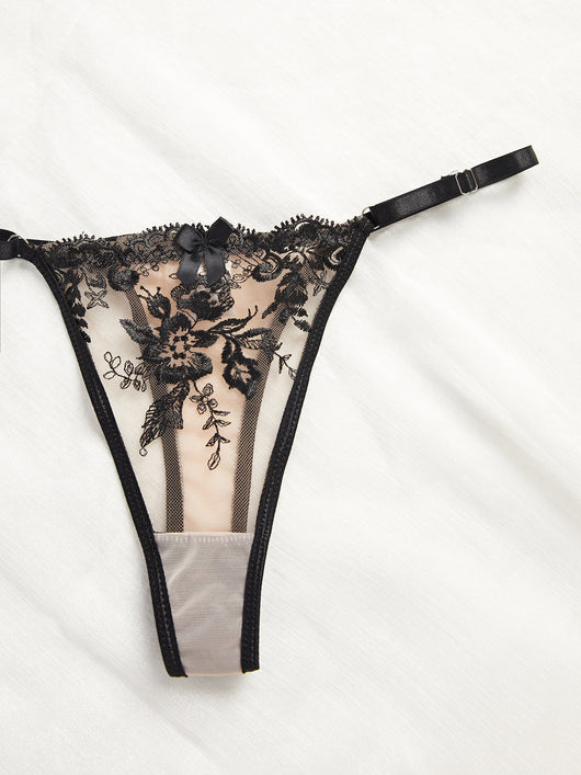 Nude and black embroidered sheer lingerie set with a bra, thong, and garter belt, featuring floral lace. - Image 13