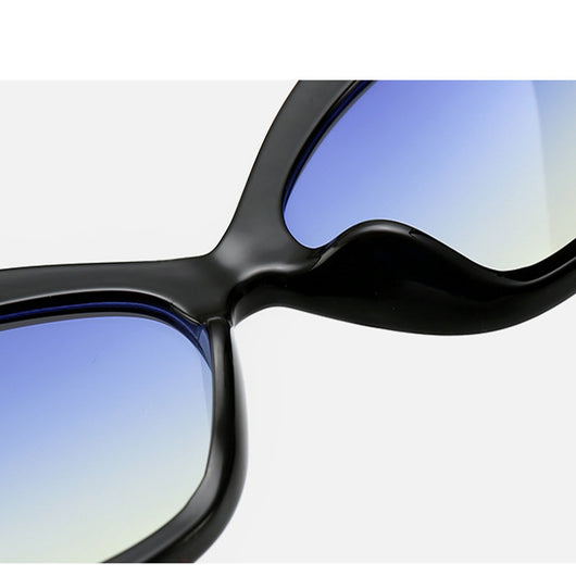 Leopard print cat-eye sunglasses with a red frame, gradient brown lenses, and a red heart embellishment. - Image 7