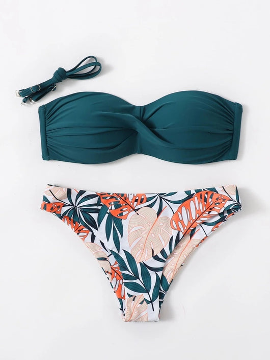 Blue bandeau bikini top with tropical leaf print high-cut bottom, styled with sandals, sunglasses, and a straw hat. - Image 17