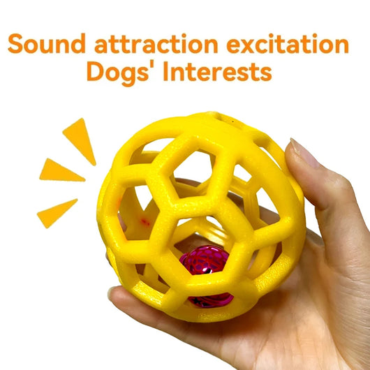 Orange TPR hollow lattice dog chew ball with a shiny pink bell ball inside for interactive pet play. - Image 17
