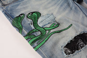 Jeans Slim Fit Azul con Pliegues, Detalles de Piel de Serpiente y Rotos Bordados - Image 11