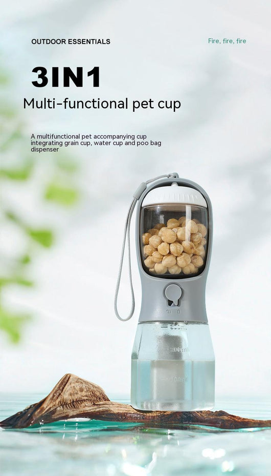 Purple 3-in-1 portable pet water bottle with food compartment, waste bag dispenser, and lanyard. - Image 17
