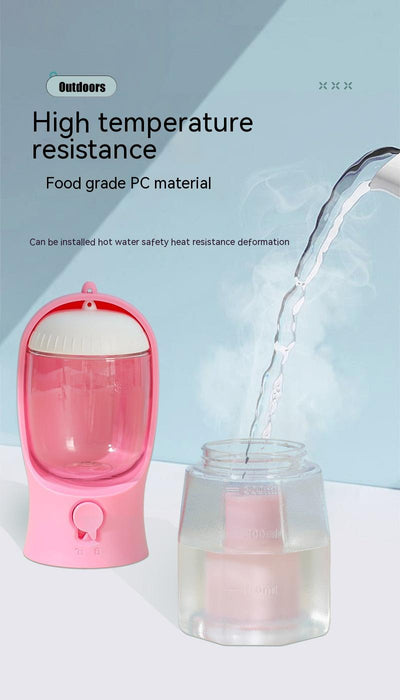 Purple 3-in-1 portable pet water bottle with food compartment, waste bag dispenser, and lanyard. - Image 23