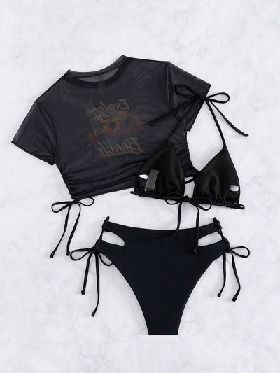 Black three-piece swimsuit with a mesh crop top featuring an "Explore the Beach" graphic, bikini top, and high-waisted bottoms. - Image 47