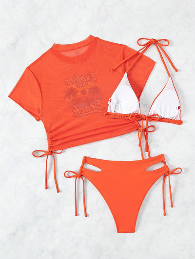 Black three-piece swimsuit with a mesh crop top featuring an "Explore the Beach" graphic, bikini top, and high-waisted bottoms. - Image 57