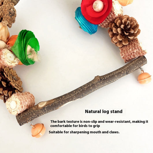 Natural wood parrot swing with pine cones, colorful wooden pieces, and small bells for chewing and perching. - Image 17