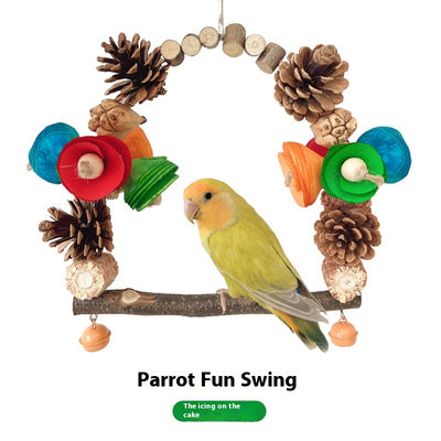 Natural wood parrot swing with pine cones, colorful wooden pieces, and small bells for chewing and perching. - Image 21
