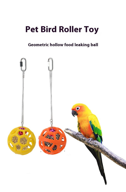 Orange hollow rubber ball bird toy with a pink bell inside, hanging from a silver chain and carabiner clip. - Image 12