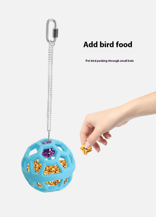 Orange hollow rubber ball bird toy with a pink bell inside, hanging from a silver chain and carabiner clip. - Image 14