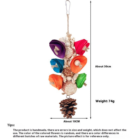 Blue parrot playing with a colorful natural material bird toy featuring corn cobs, wood, and pinecones, hanging in a white birdcage. - Image 21