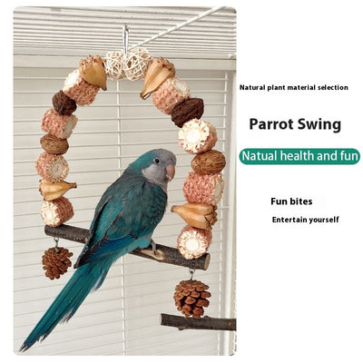 Natural wooden parrot swing with an arched top made of corn cobs, seed pods, and woven balls, featuring a log perch and two hanging pine cones. - Image 17