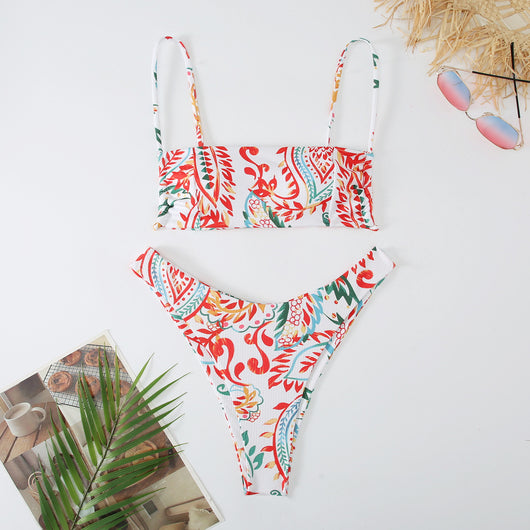 White ribbed two-piece swimsuit with pink and blue paisley floral print, bandeau top, and high-cut bottoms. - Image 21