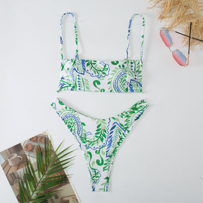 White ribbed two-piece swimsuit with pink and blue paisley floral print, bandeau top, and high-cut bottoms. - Image 26