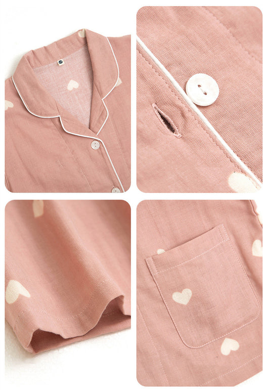 Pink long-sleeved pajama set for children with an all-over cherry print, Peter Pan collar, and matching pants. - Image 10