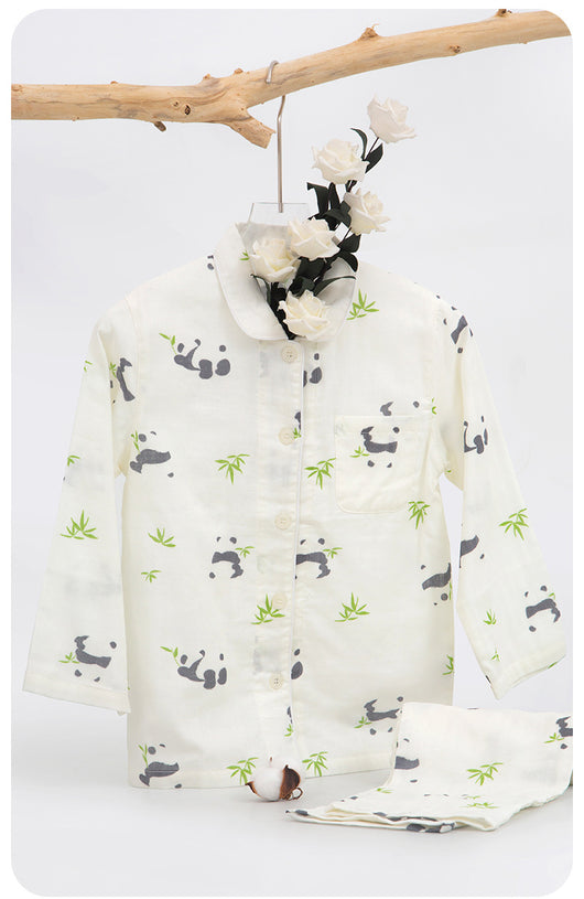 Pink long-sleeved pajama set for children with an all-over cherry print, Peter Pan collar, and matching pants. - Image 13