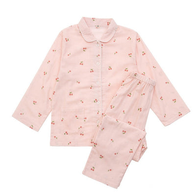 Pink long-sleeved pajama set for children with an all-over cherry print, Peter Pan collar, and matching pants. - Image 16