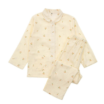 Pink long-sleeved pajama set for children with an all-over cherry print, Peter Pan collar, and matching pants. - Image 17