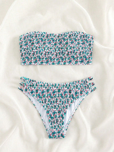 Floral smocked strapless bandeau bikini with high-cut bottoms featuring side straps, in white, teal, and red. - Image 14