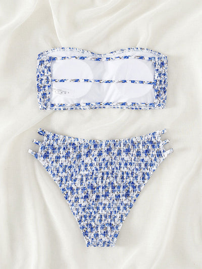 Floral smocked strapless bandeau bikini with high-cut bottoms featuring side straps, in white, teal, and red. - Image 19