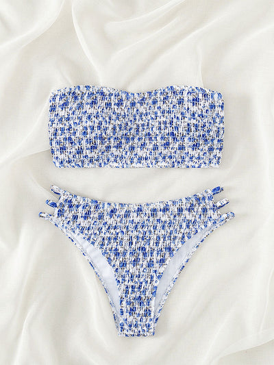 Floral smocked strapless bandeau bikini with high-cut bottoms featuring side straps, in white, teal, and red. - Image 24