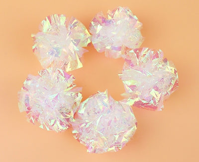 Five iridescent crinkle paper balls, likely cat toys, arranged in a circle on a peach background. - Image 19