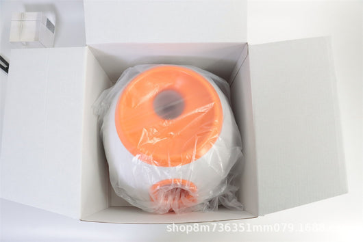 Orange and white pet intelligence ball dispenser with three foam balls, designed as a dog toy. - Image 25