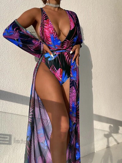 Women's tropical print one-piece swimsuit with deep V-neck and high-cut leg, paired with a matching long-sleeve cover-up. - Image 31