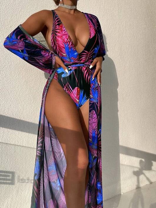 Women's tropical print one-piece swimsuit with deep V-neck and high-cut leg, paired with a matching long-sleeve cover-up. - Image 31