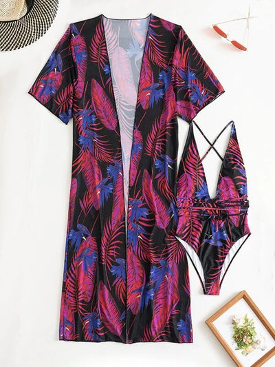 Women's tropical print one-piece swimsuit with deep V-neck and high-cut leg, paired with a matching long-sleeve cover-up. - Image 33