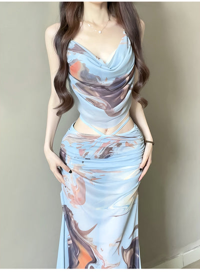 Purple and brown tie-dye two-piece swimsuit with a ruched cowl neck halter top and a matching high-waisted skirt. - Image 9