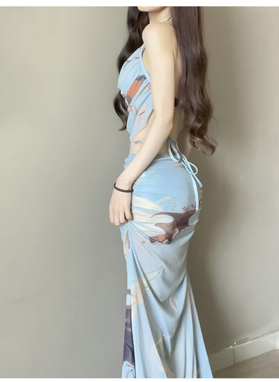 Purple and brown tie-dye two-piece swimsuit with a ruched cowl neck halter top and a matching high-waisted skirt. - Image 10