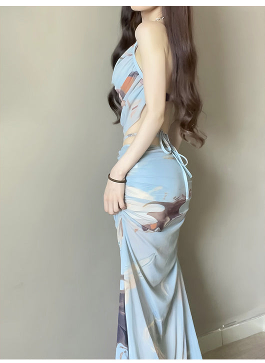 Purple and brown tie-dye two-piece swimsuit with a ruched cowl neck halter top and a matching high-waisted skirt. - Image 10