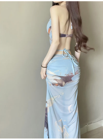 Purple and brown tie-dye two-piece swimsuit with a ruched cowl neck halter top and a matching high-waisted skirt. - Image 11