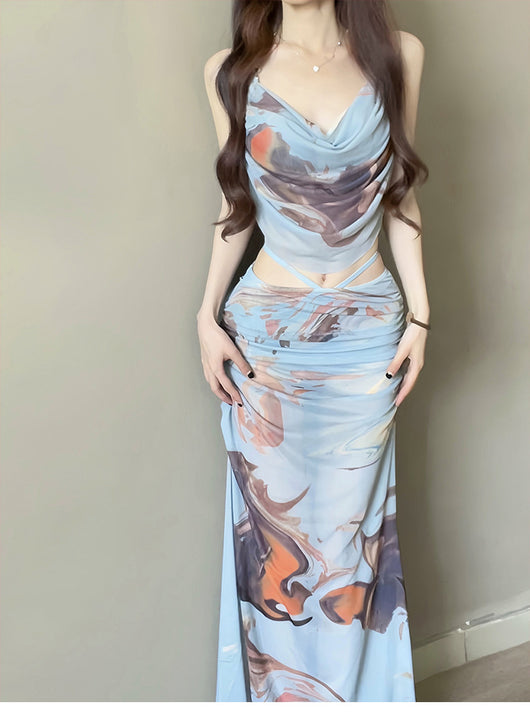 Purple and brown tie-dye two-piece swimsuit with a ruched cowl neck halter top and a matching high-waisted skirt. - Image 12