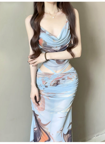 Purple and brown tie-dye two-piece swimsuit with a ruched cowl neck halter top and a matching high-waisted skirt. - Image 15
