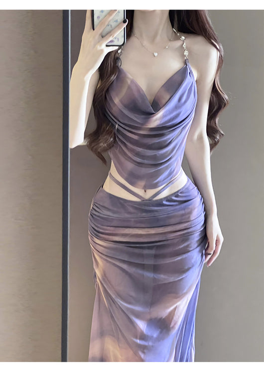 Purple and brown tie-dye two-piece swimsuit with a ruched cowl neck halter top and a matching high-waisted skirt. - Image 17