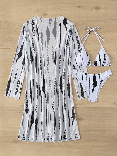 White and black tie-dye three-piece bikini set with a triangle top, high-cut bottoms, and a sheer long-sleeve cover-up. - Image 7