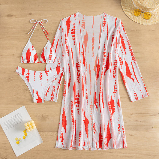 White and black tie-dye three-piece bikini set with a triangle top, high-cut bottoms, and a sheer long-sleeve cover-up. - Image 9