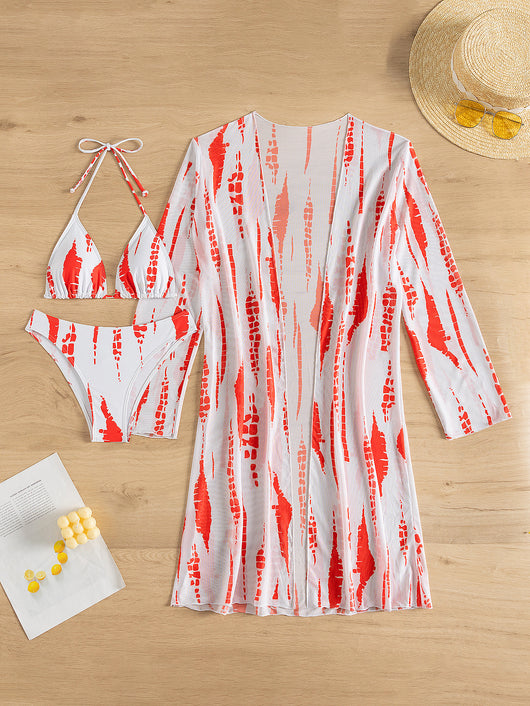 White and black tie-dye three-piece bikini set with a triangle top, high-cut bottoms, and a sheer long-sleeve cover-up. - Image 27