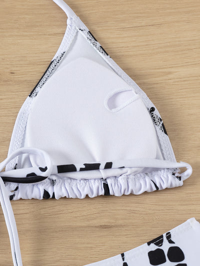 White and black tie-dye three-piece bikini set with a triangle top, high-cut bottoms, and a sheer long-sleeve cover-up. - Image 28
