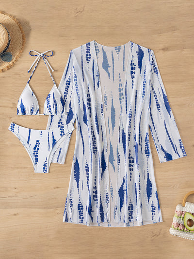 White and black tie-dye three-piece bikini set with a triangle top, high-cut bottoms, and a sheer long-sleeve cover-up. - Image 30