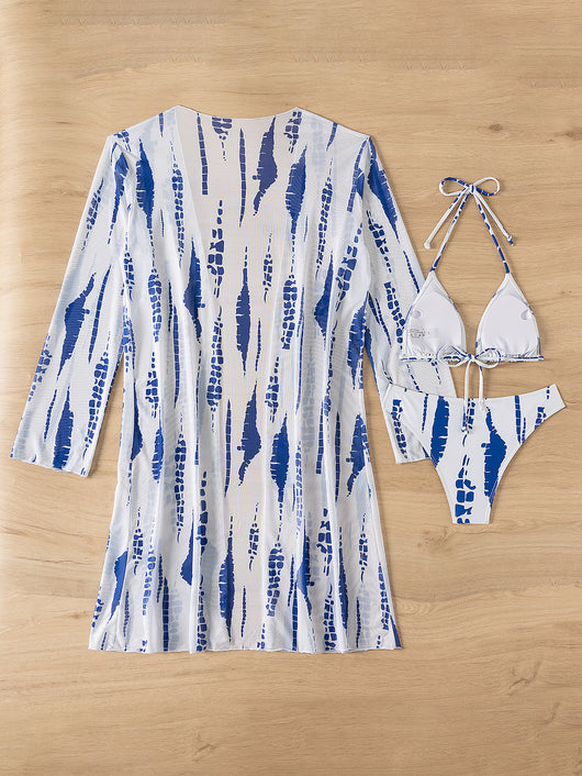 White and black tie-dye three-piece bikini set with a triangle top, high-cut bottoms, and a sheer long-sleeve cover-up. - Image 31
